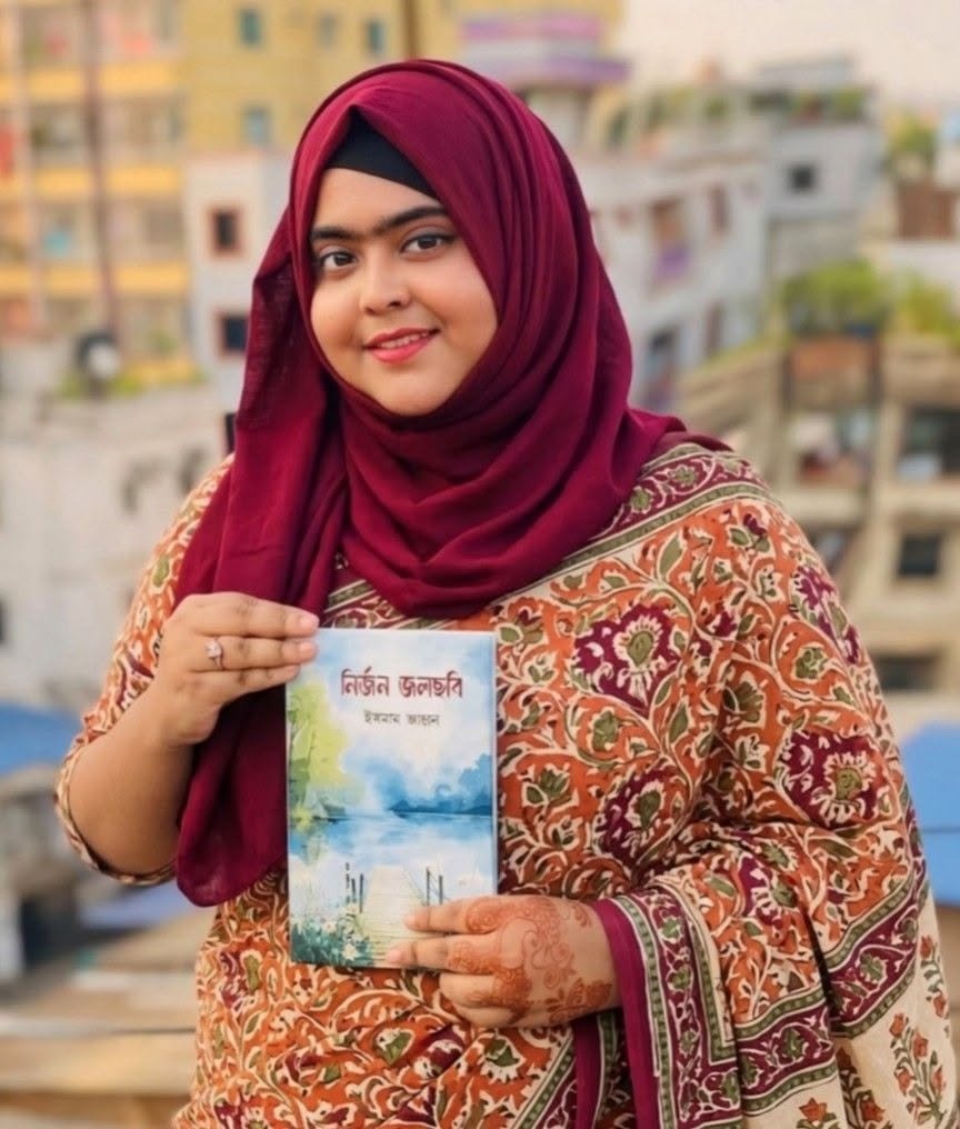 Ismam Jahan holding her book Nirjon Jolchobi